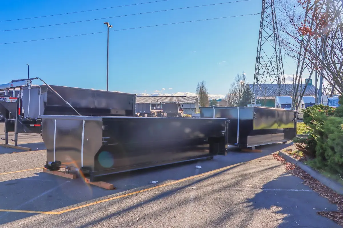 Roll-off dumpster ready for waste disposal at job site for 2 Yard Dumpster Rental in Wood River